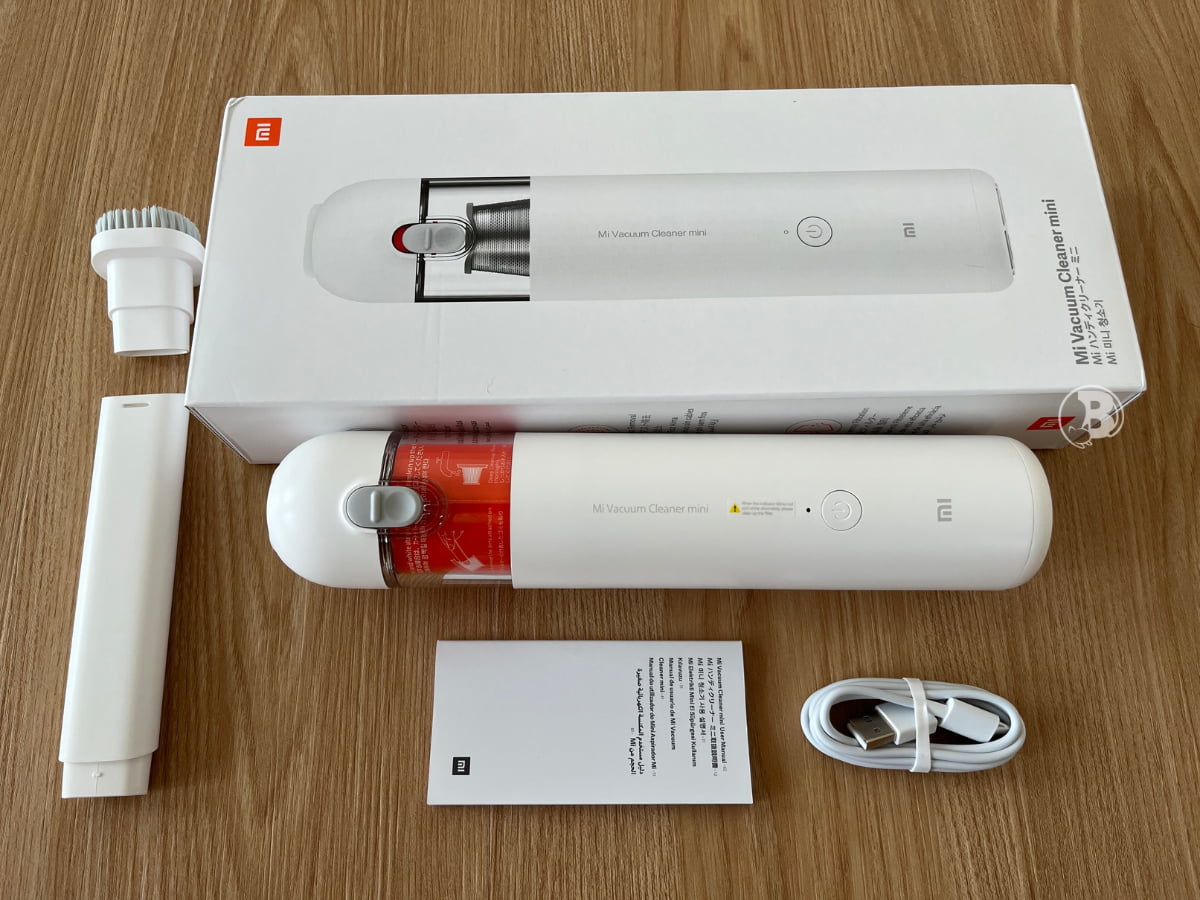 Flat Lay Of The Mi Vacuum Cleaner Mini And Accessories