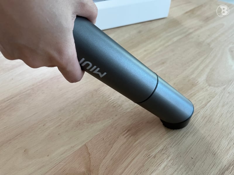 Using HEPA Filter Of The MIUI Portable Hand Vacuum Cleaner On A Flat Surface